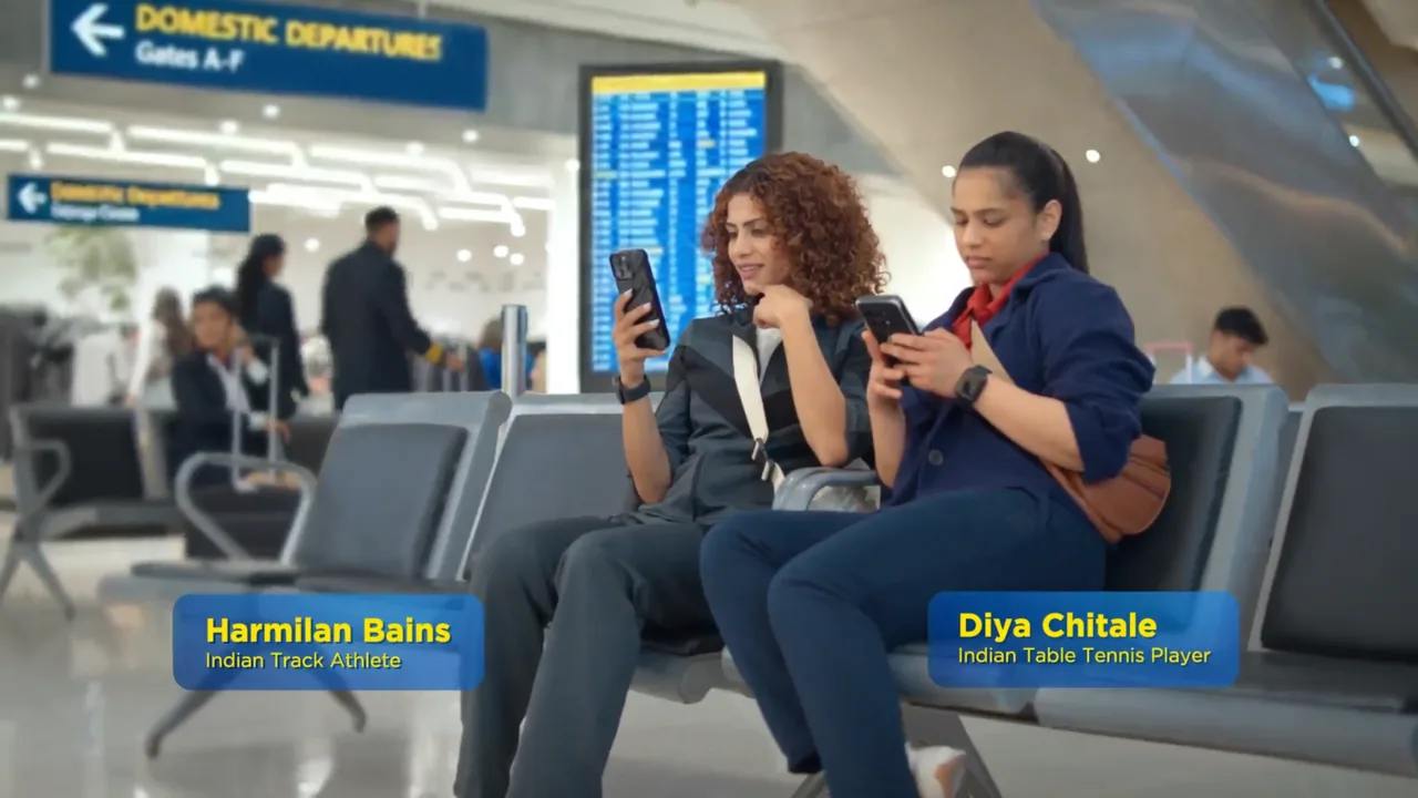 Indian Rupee banknotes and coins next to a smartphone displaying a digital payment app interface, symbolizing the Digita (1)