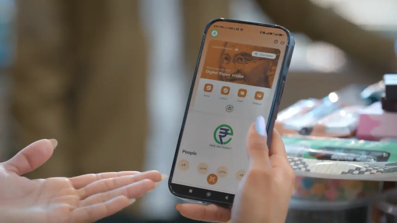 Indian Rupee banknotes and coins next to a smartphone displaying a digital payment app interface, symbolizing the Digita (2)